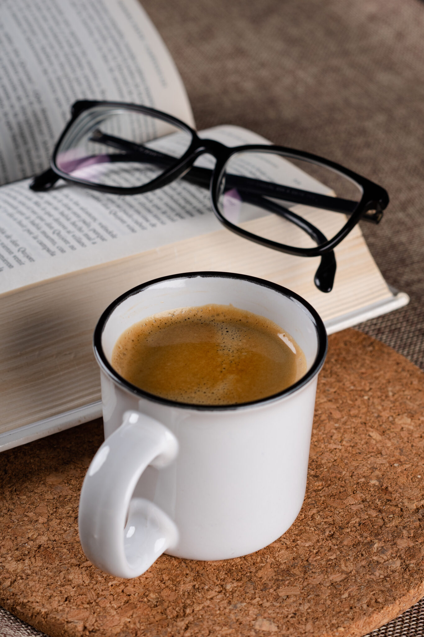 A,Closeup,Shot,Of,A,Cup,Of,Coffee,Optical,Glasses